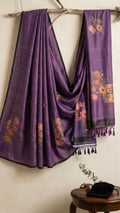 Deep Purple Textured Silk-Blend Saree with Pastel Floral Embroidery and Tassels